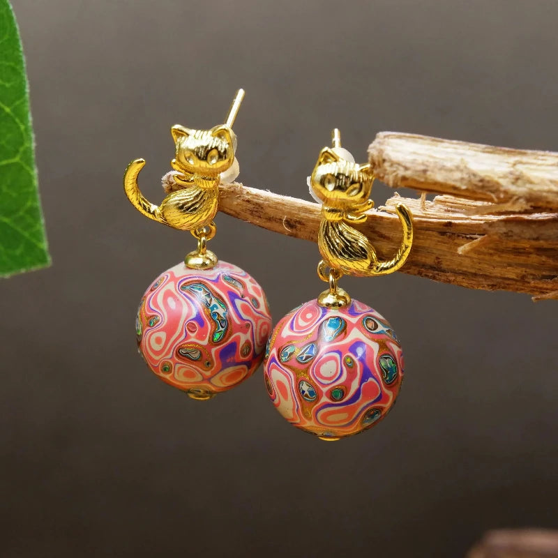 Pink lacquer bead cat earrings, copper electric gold plated, gold line temperament high-grade earrings