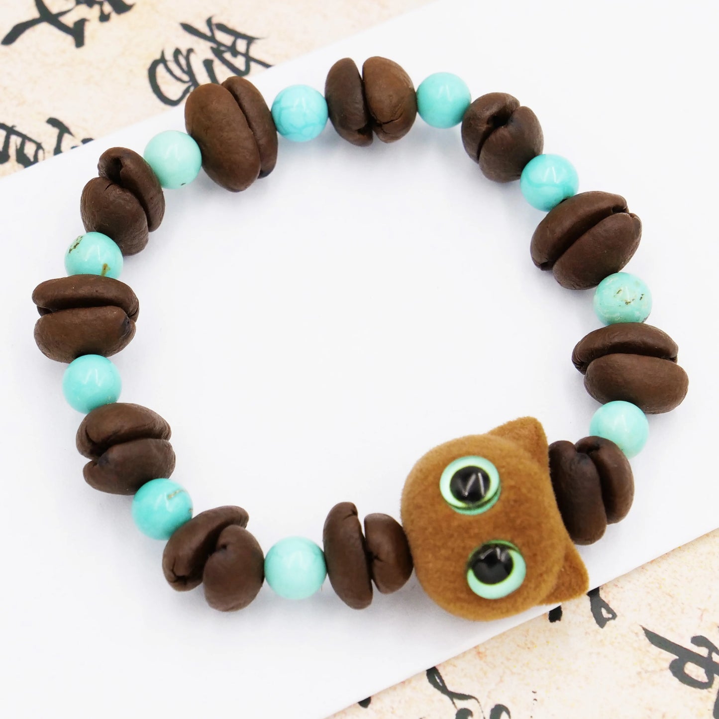 Cute cat shape coffee beans woven blue bracelet, refreshing to talk about the aroma of coffee beans